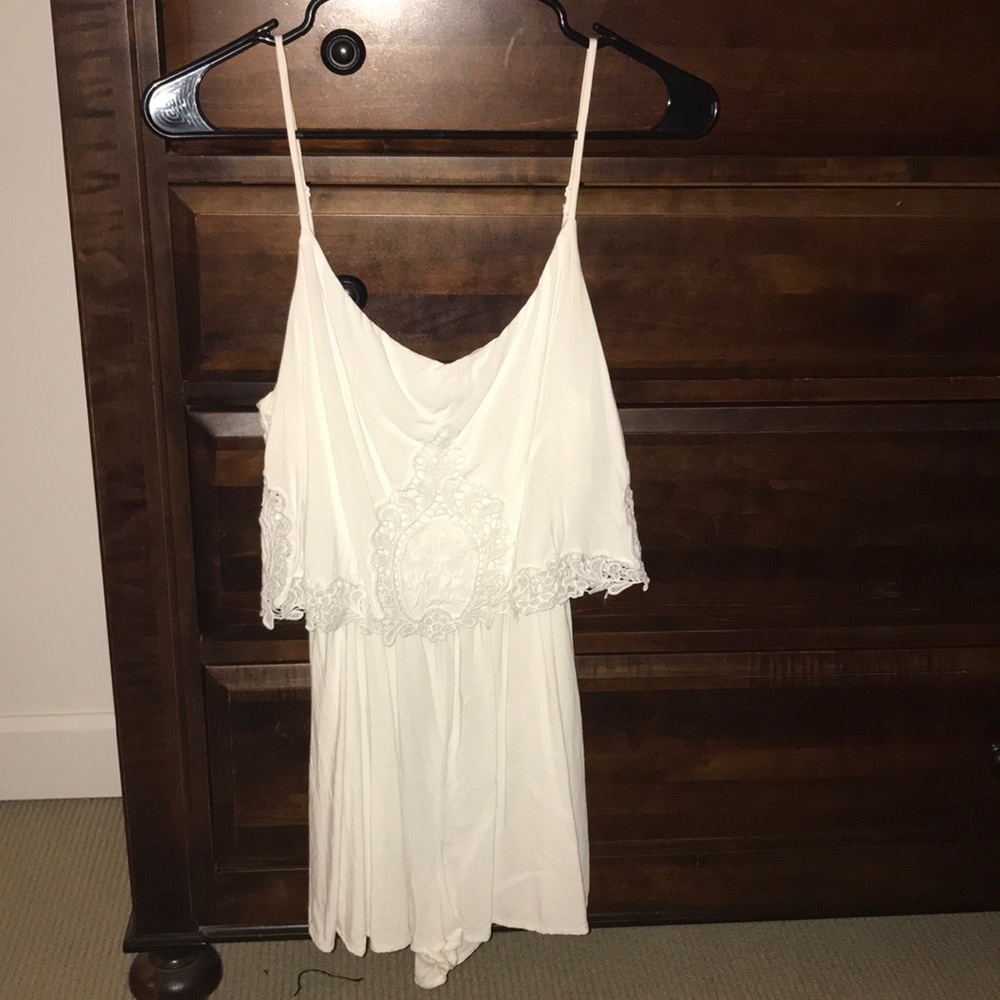 White romper with lace detail